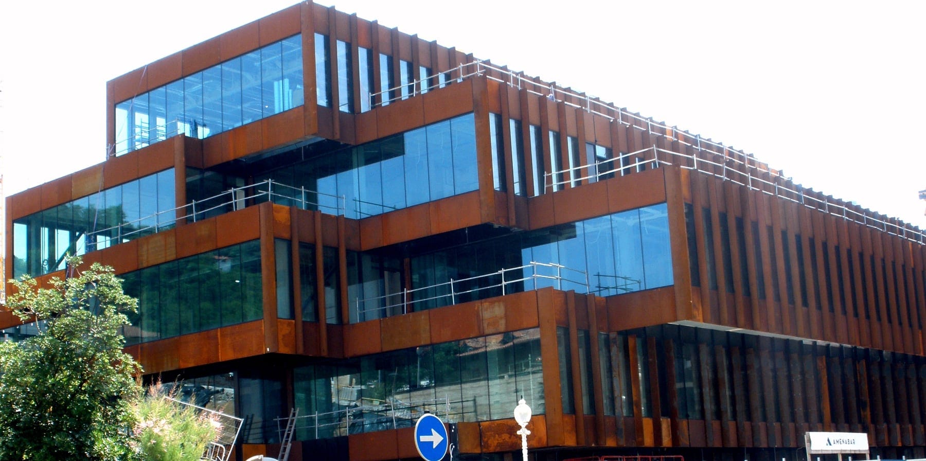 Rust-coloured steel and glass Gastronomy Open Ecosystem building of the Basque Culinary Center, San Sebastian